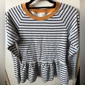 Anthroplogie’s t.la XS lightweight peplem style sweatshirt